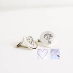 Two Engraved Cufflinks featuring childlike drawings, shown beside two small photos of the original artwork.