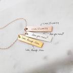 The Vertical Handwriting Bar Necklace is a personalized custom jewelry piece available in gold, silver, and rose gold, each engraved with your handwritten message.