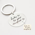 The Handwriting Circle Keychain, engraved with your handwritten message "Lucky to be your daughter" and a heart, makes a thoughtful personalized gift she’ll cherish.