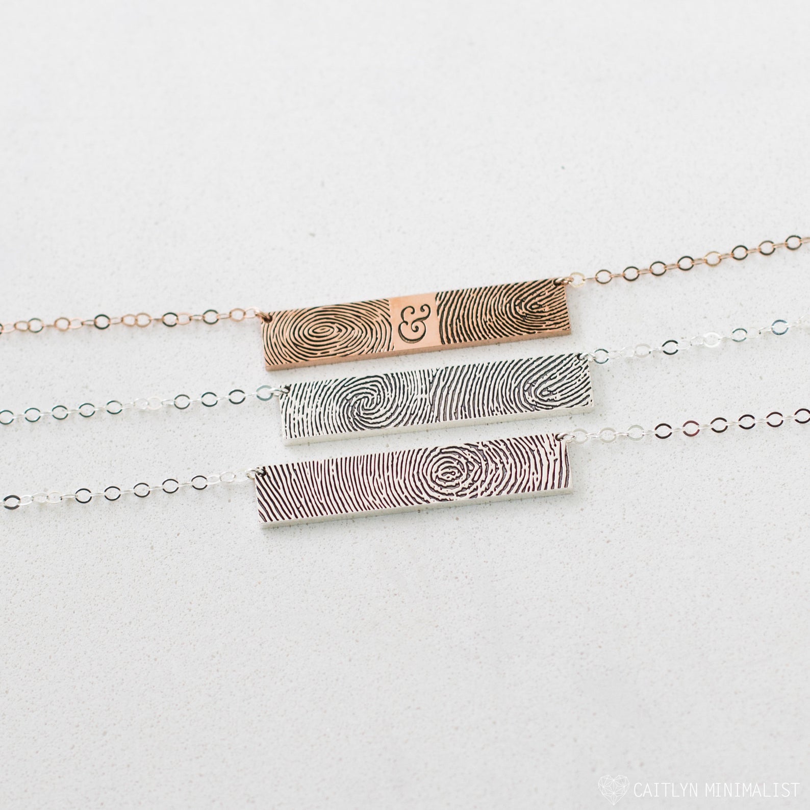 The Handwriting Bar Necklace in Rose Gold, shown on a delicate chain against a light background, is a personalized jewelry piece and makes a thoughtful gift for someone special.