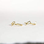 Two delicate Venice Name Rings in elegant cursive, shown on a light background—perfect custom jewelry pieces.
