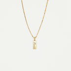 The Dainty Tag Name Necklace in Rose Gold features a rectangular pendant engraved with "love," showcased on a plain white background. This elegant and timeless piece is perfect for everyday wear.