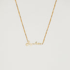 Venice Name Necklace in Box Chain featuring a dainty cursive pendant, displayed against a simple light background.