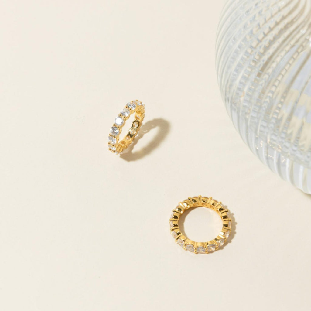 The Christy Ring is a stackable diamond ring, perfect for adding elegance to your feminine jewelry collection.