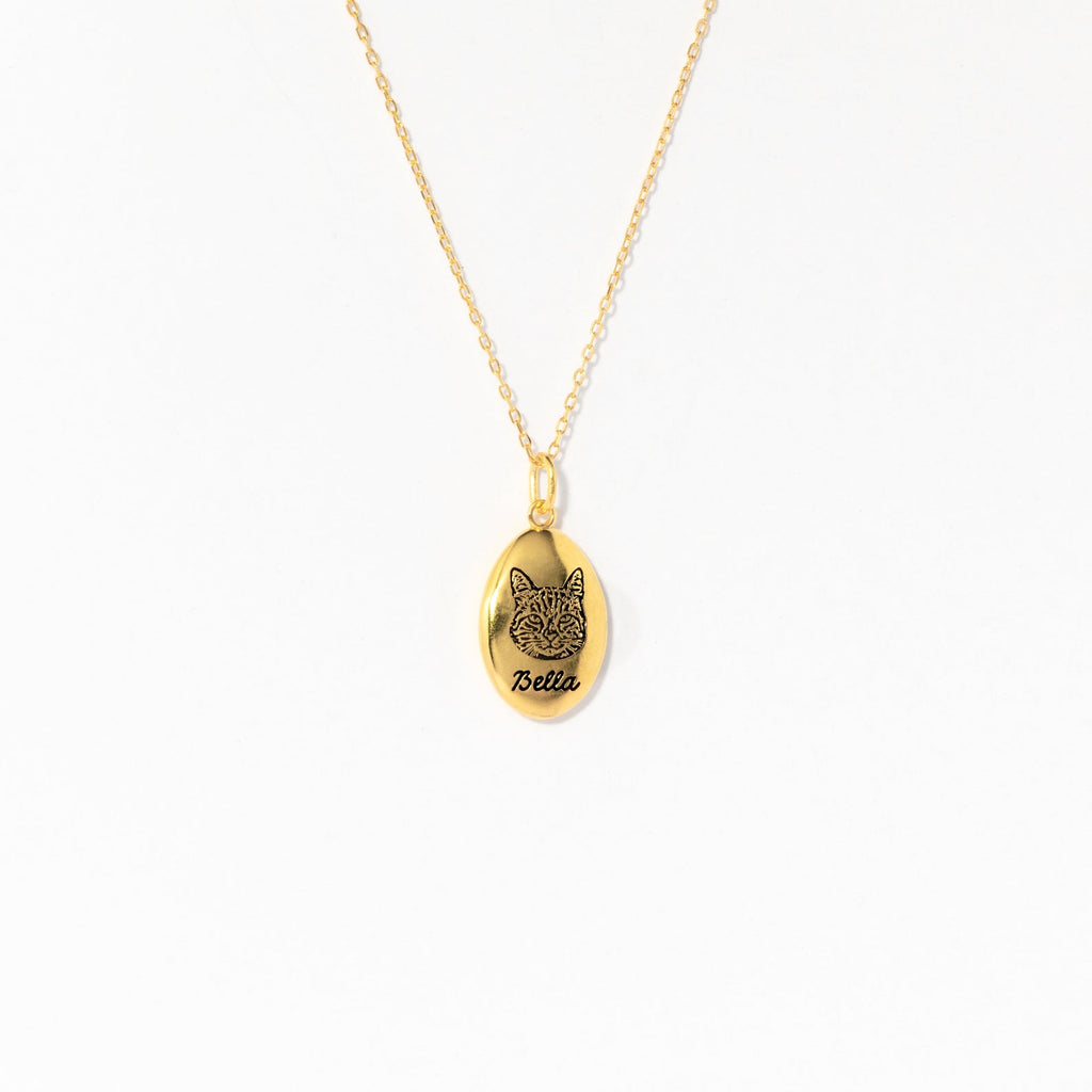 Oval Pet Necklace with an engraved cat face and the name Bella—ideal personalized pet jewelry or a unique pet portrait accessory for animal lovers.