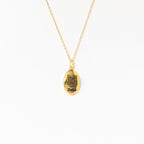 Oval Pet Necklace with an engraved cat face and the name Bella—ideal personalized pet jewelry or a unique pet portrait accessory for animal lovers.