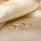 The Pave Wire Diamond Hoops are dainty gold and silver minimalist earrings, ideal for anyone seeking elegant diamond hoops with a subtle touch of sophistication.