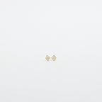 The Avery Geometric Diamond Studs feature a bold diamond shape, ideal for adding a modern touch to any outfit.