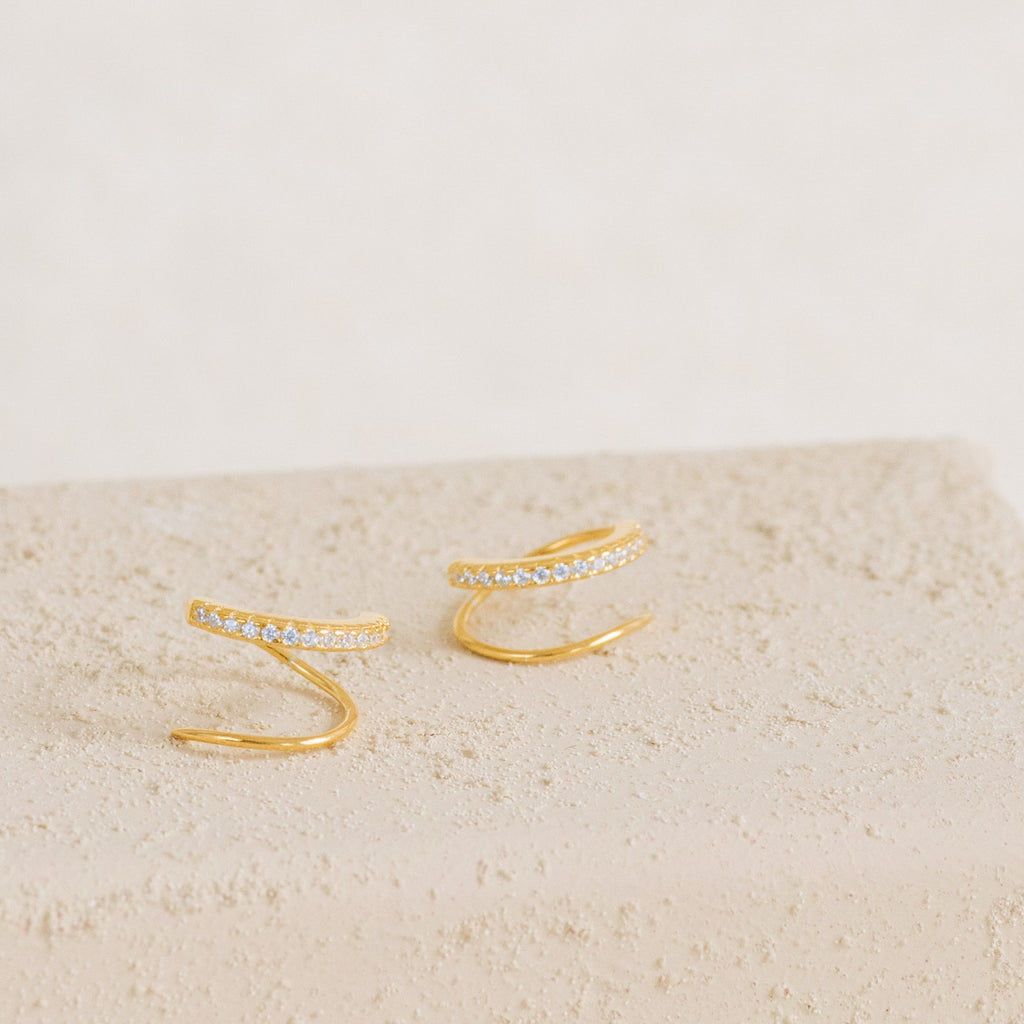 Huggies de alambre River Pave