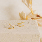 Huggies de alambre River Pave