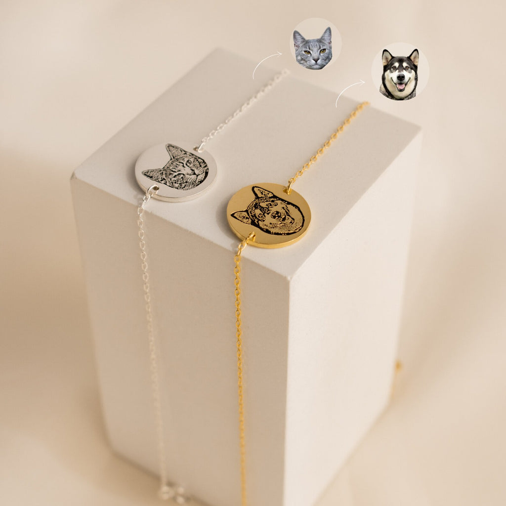 The Pet Portrait Disc Bracelet features pet faces engraved on round pendants, displayed elegantly—making it a heartfelt piece of jewelry and a perfect memorial gift for animal lovers.