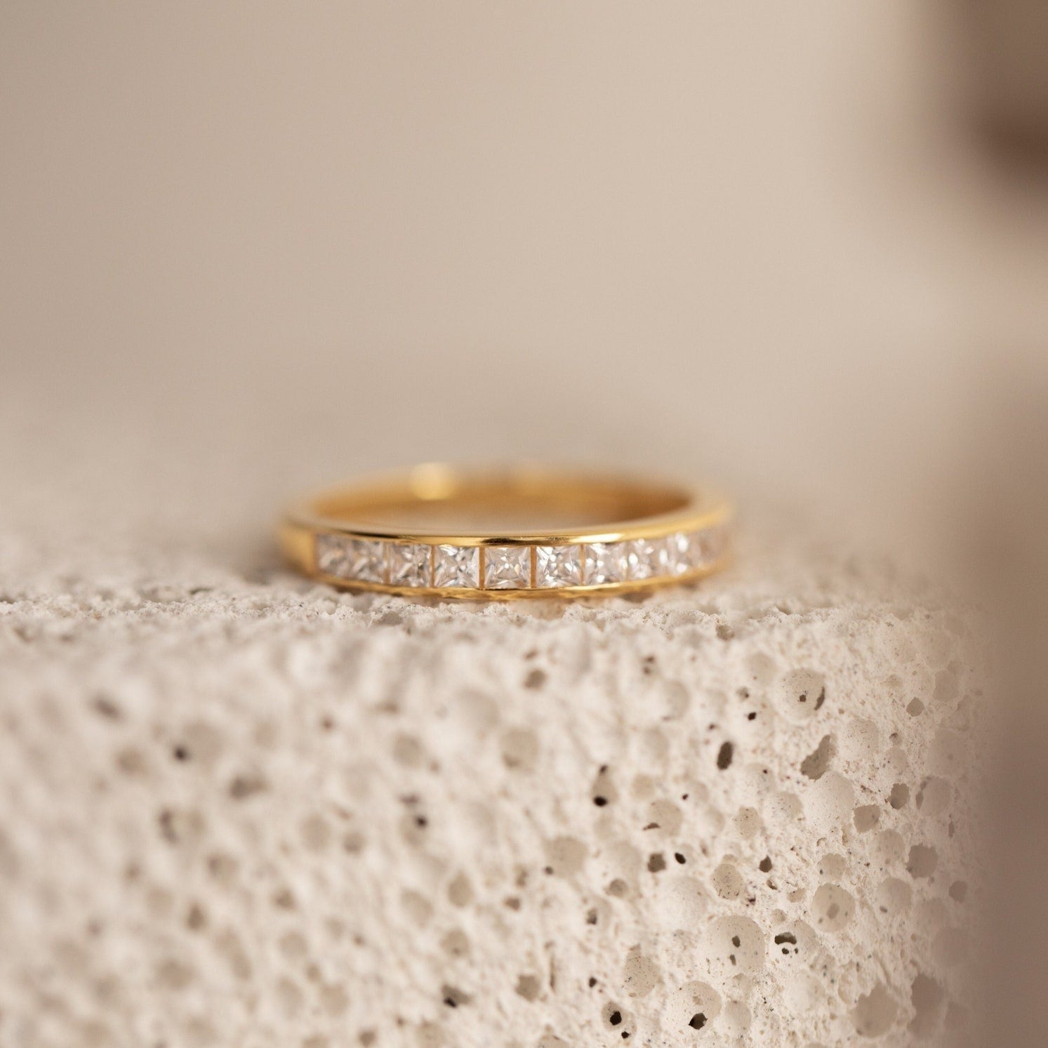 Evermore Diamond Band in 18K gold with a row of rectangular-cut pave diamonds.