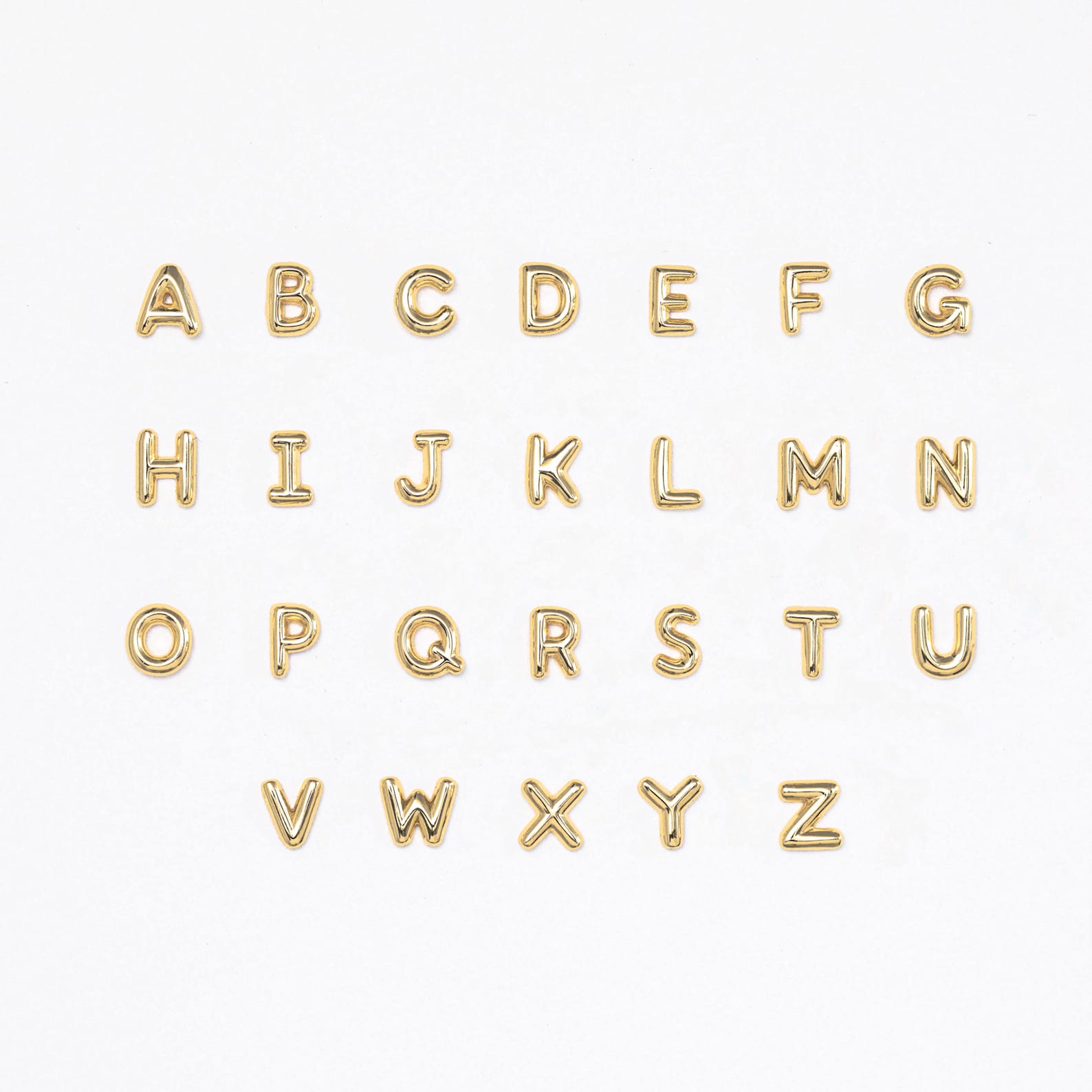 Bubble Letter Studs featuring gold alphabet letters A to Z, arranged in four rows on a white background—ideal for personalized earrings or as an elegant bridesmaid gift.