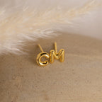 Bubble Letter Studs are gold initial charm earrings—stylish, personalized accessories that make a perfect gift for bridesmaids or anyone special.