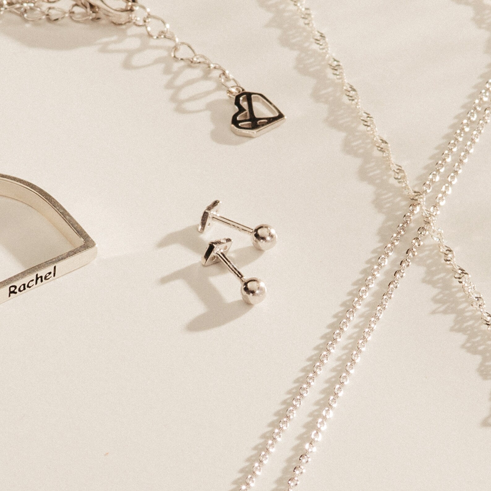 Jocelyn Diamond Studs—elegant silver earrings that add a sparkling touch to your everyday style.