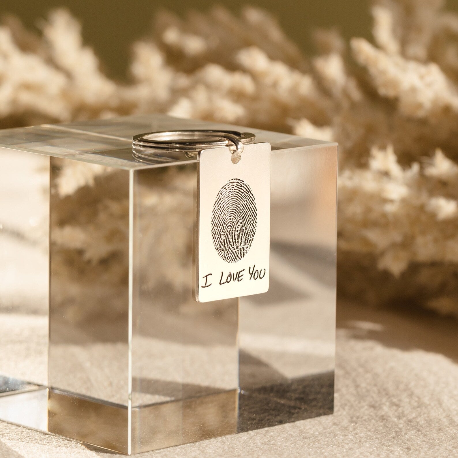 Fingerprint Rectangle Keychain with "I Love You" engraving, beautifully displayed on a clear acrylic block—a personalized keepsake for any occasion.