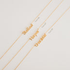 Three gold Maine Kid's Name Necklaces with personalized name pendants—Stella, Harper, and Charlotte—in various fonts. A charming custom piece for a unique touch.