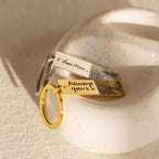 The Fingerprint Bar Keychain features two engraved keychains—one silver with "Love, Mom," and one gold with "Always yours x"—both with your actual fingerprints. This personalized keepsake is a touching reminder of your unique bond.