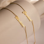 Two Natural Name Necklaces in Box Chain with custom Madison and Caroline pendants are displayed on a white surface—making a perfect personalized accessory and thoughtful gift.