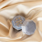 The Mystery Ring Box showcases four gold rings on soft champagne-colored satin, making it a stylish addition to your collection or a convenient ring sizer for your favorite styles.