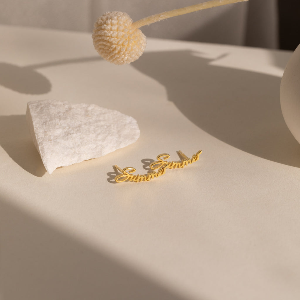 Grace Name Earrings—a white accessory adorned with a flower, perfect as a custom gift or for creating personalized earrings.