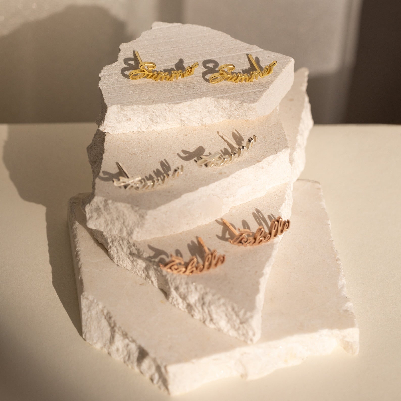 The Grace Name Earrings are perfect for showcasing custom gift ideas, such as personalized or unique name stud earrings.