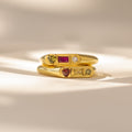 The Bold Birthstone Signet Ring, featuring a vibrant gemstone, is displayed on a neutral background with soft lighting and gentle shadows—ideal as a birthstone ring or customizable jewelry.