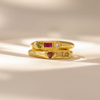 The Bold Birthstone Signet Ring, featuring a vibrant gemstone, is displayed on a neutral background with soft lighting and gentle shadows—ideal as a birthstone ring or customizable jewelry.