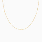 Isolated product shot of the Figaro chain necklace on a white background, showcasing its symmetrical link design.
