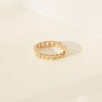 The Curb Chain Ring is shown on a light-colored surface with soft shadows, making it the perfect goth glam jewelry piece to elevate your style.