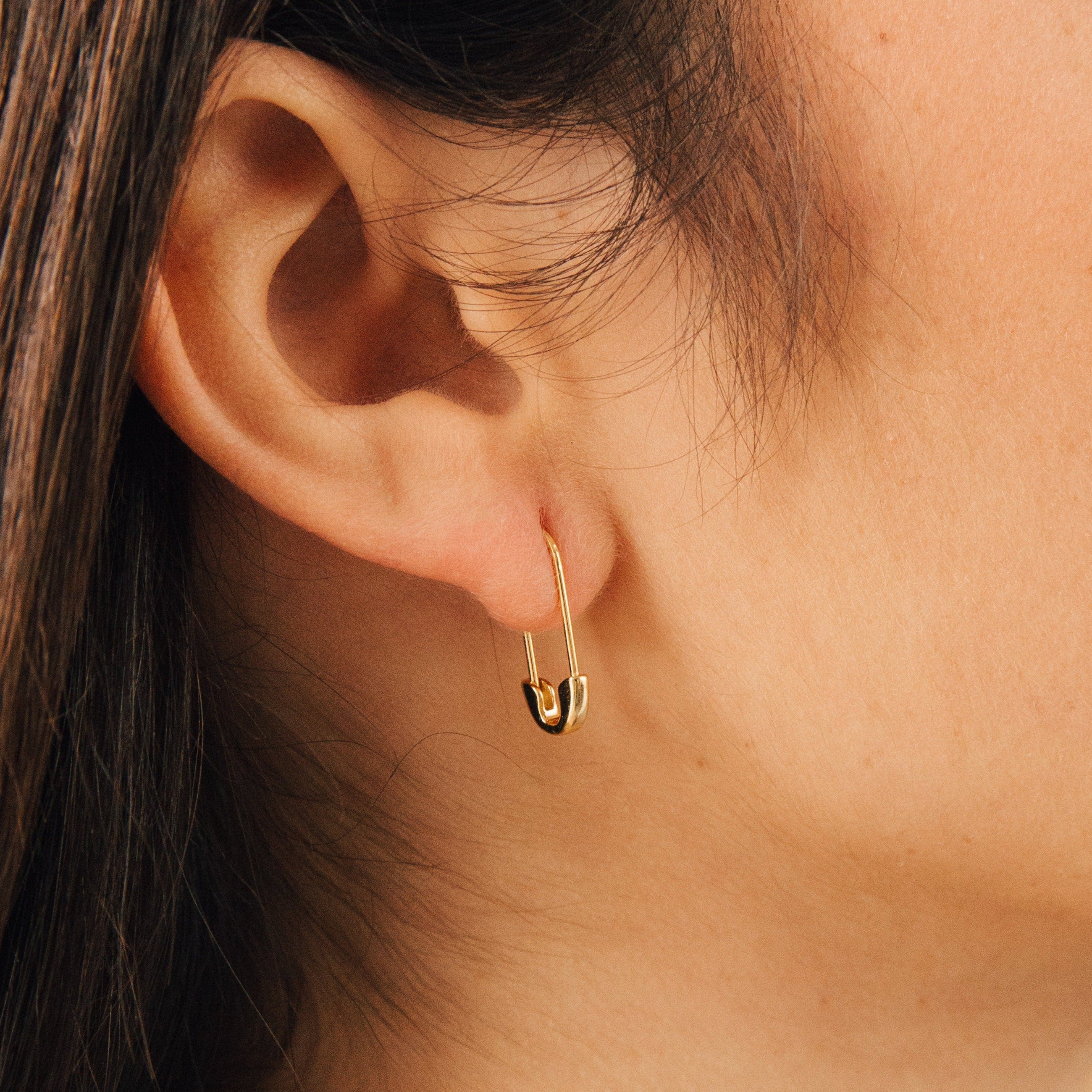 Ava Earrings add a funky, statement touch when worn on the ear—perfect for those who love bold, unique accessories.
