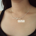 The Handwriting Necklace features “All my love” in silver cursive, personalized from your handwritten note—a sentimental keepsake she’ll cherish.